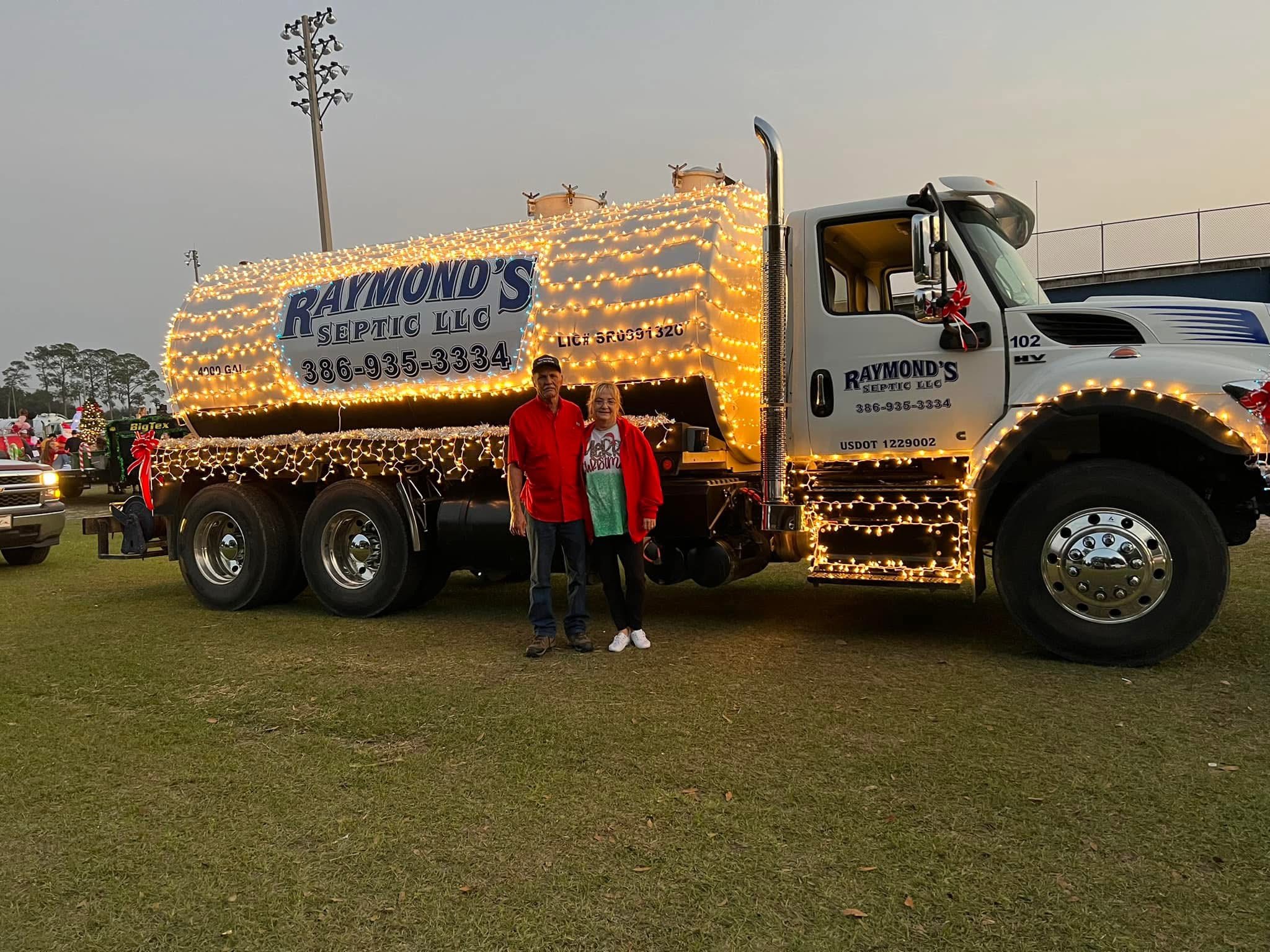 Raymond's Septic Truck with Christmas Lights
